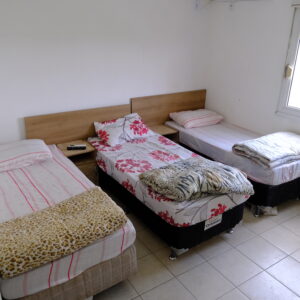 Suíte para 5 Pessoas (5 Camas de Solteiro)